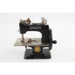 Vintage Singer children's toy/miniature sewing machine