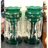 Pair of victorian green glass lustres complete with glass droppers