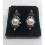 Rose diamond and pearl earrings set with large central pearl that measures approx 9mm dia with