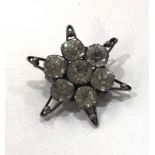 Antique sterling silver paste set starburst brooch