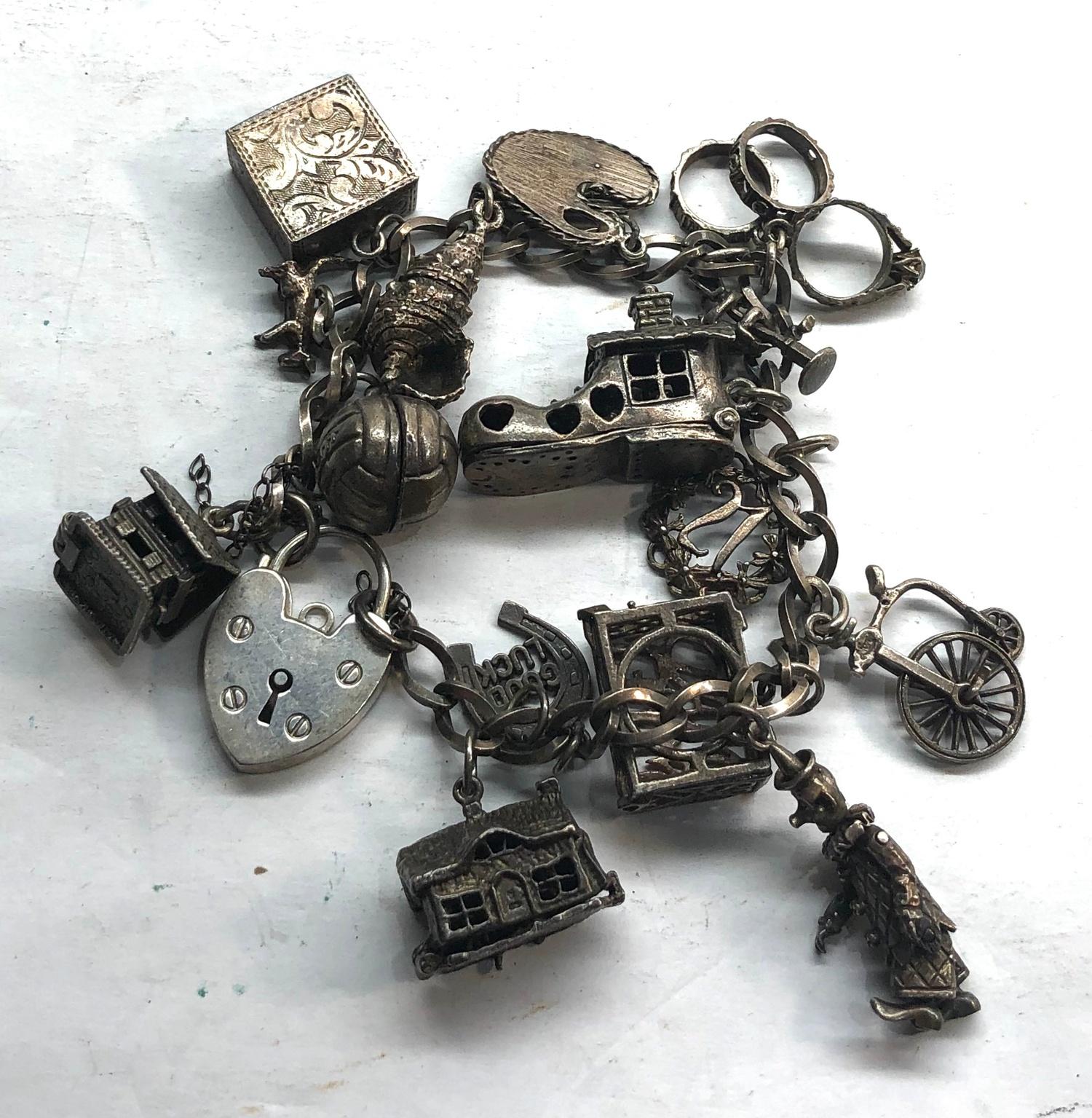 Vintage silver charm bracelet and charms weight 71g