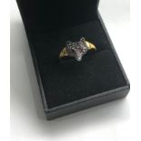Fox head ring set with rose diamonds and ruby eyes set in gold and silver front