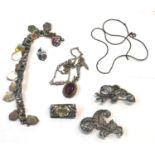 Selection of vintage silver jewellery includes marcasite brooches and flag charm bracelet