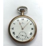 Omega pocket watch watch winds and ticks gold plated case worn condition movement and dial in good