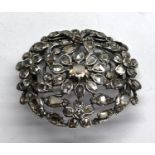 Antique rose diamond brooch set in silver and gold mounts measure approx 40mm by 35mm centre stone