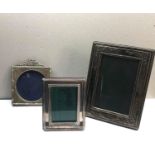 3 Vintage silver picture frames largest measures approx. 18cm by 14cm