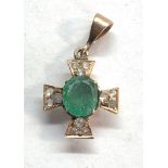 Small gold diamond and emerald pendant central emerald measures approx 8mm by 7mm