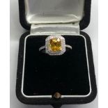 Fine 2.46ct yellow sapphire and diamond ring central yellow sapphire measures approx 8mm by 7mm with