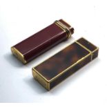 2 Cartier cigarette lighters