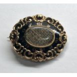 Large Victorian gold and enamel mourning brooch engraved on back as shown in image measures approx