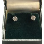 Pair of diamond stud earring each have a diamond that measures approx 5.1mm dia 1.02ct set in 18ct