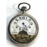 8 day open faced pocket watch watch winds and ticks good condition measure approx 49mm dia metal