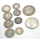 Collection of Georgian and victorian silver coins includes half crowns shillings and sixpences