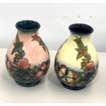 2 Moorcroft vases, both in good overall condition, approximate measurements 8 inches tall