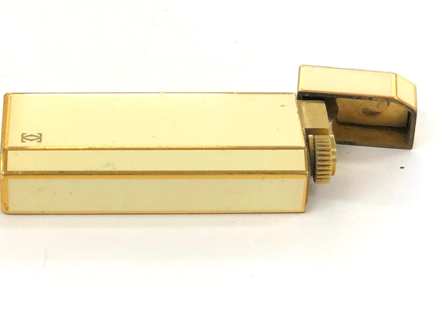 Vintage Cartier cigarette lighter, in good untested condition as shown in images.