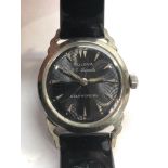 vintage black face Bulova gents wristwatch 23 jewel self winding watch is ticking but no warranty
