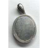 antique silver locket measures approx 4cm by 3.2cm not including loop not hallmarked but acid tested