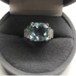 platinum diamond and aquamarine ring central aquamarine measures approx 10mm by 10mm with 6 diamonds