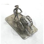 Dutch miniature silver, man pushing a barrel measures 5.3cm by 3cm