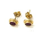 Pair Gold and ruby earrings, no hallmarks but test as gold, approximate total weight 2.4g