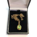 9ct Gold Peridot pendant and chain stone measures approx 10mm by 9mm with a gold chain that measures