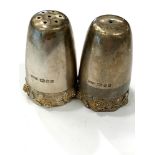 Hallmarked ornate modernist salt and pepper pots, London silver hallmarks, makers mark HOL,