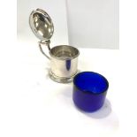 Silver hallmarked mustard pot by Walker and Hall, blue glass liner in good condition, overall