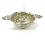 Two handled silver chased dutch dish, approximate weight: 155g, approximate measurements (handle