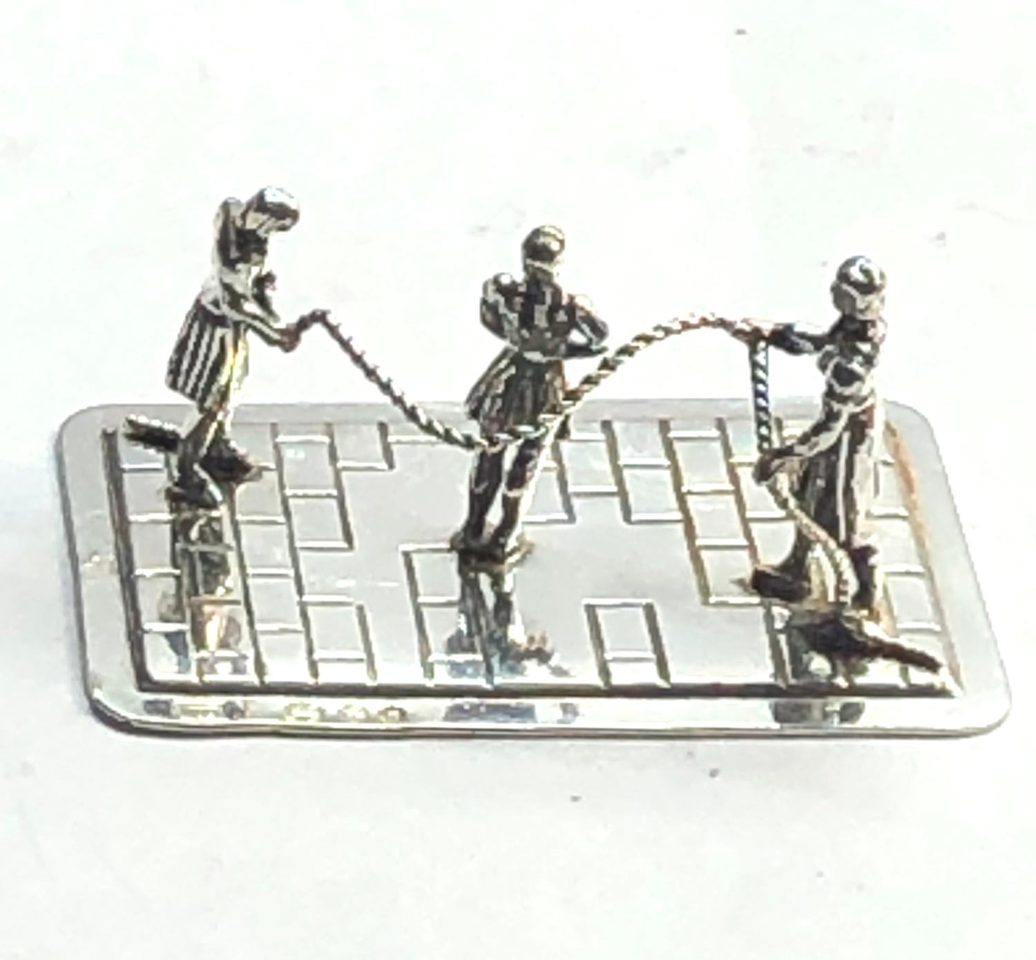 Vintage dutch silver miniature girls skipping measure approx 4cm wide dutch silver hallmarks, good