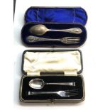 2 antique boxed silver christening sets