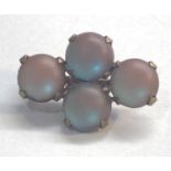 Antique saphiret brooch set with 4 cabachon stones that each measure approx 9mm dia set in brass