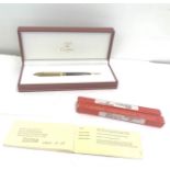 Le must de Cartier Paris black lacquer and gold plate ballpoint pen/biro w/ original box, spare