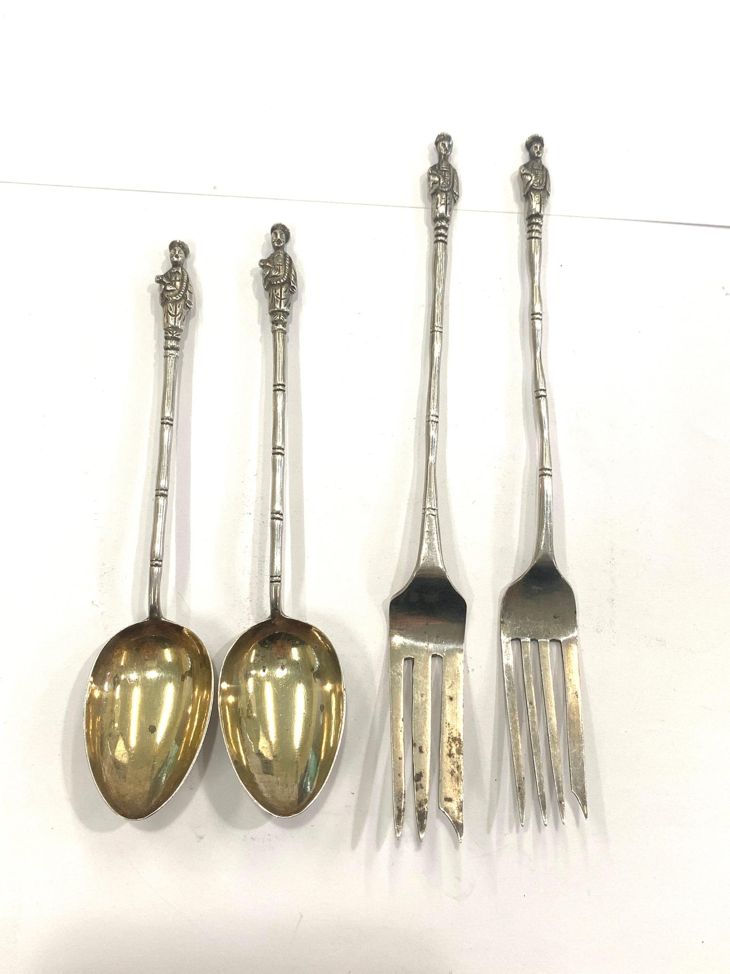 Apostle forks and spoons, total approximate weight 53.3g