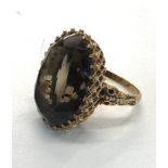 Fine large smoky quartz 9ct gold dress ring centre stone measures approx. 25mm by 17mm weight 12.4g