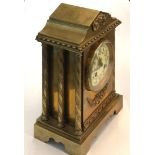 Antique brass mantle clock, measures approx 27cm tall by 18cm wide