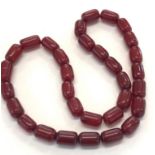 Cherry amber bakelite necklace barrel shaped beads with internal streaking each even sized bead