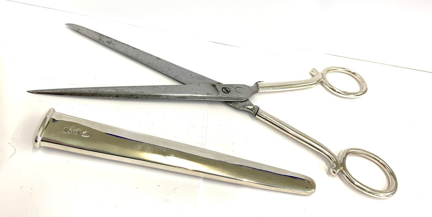 A pair of large scissors in case London 1911 by Goldsmiths and Silversmiths