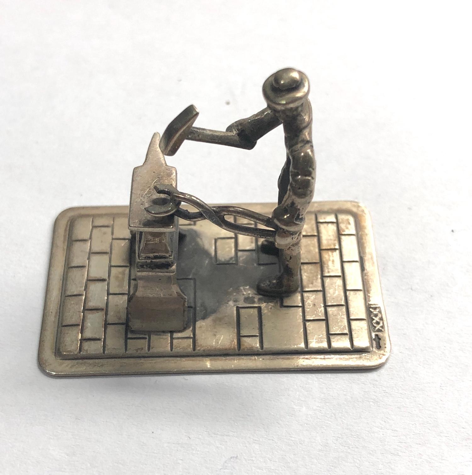 Dutch silver miniature man working on an anvil dutch sword silver hallmarks good condition