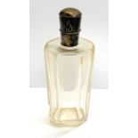 Antique silver top scent perfume bottle in good original condition small sword silver hallmark to