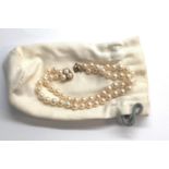 Vintage 14ct gold mounted pearl bracelet measures approx 21cm hallmarked 14ct gold clasp with 2 rows
