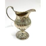 18th Century cream jug, no markings but tests as silver does not sit flat weight 88g