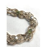 FIINE 9ct gold Murle Bennett peridot and pearl bracelet measures approx 20cm long by 10mm wide