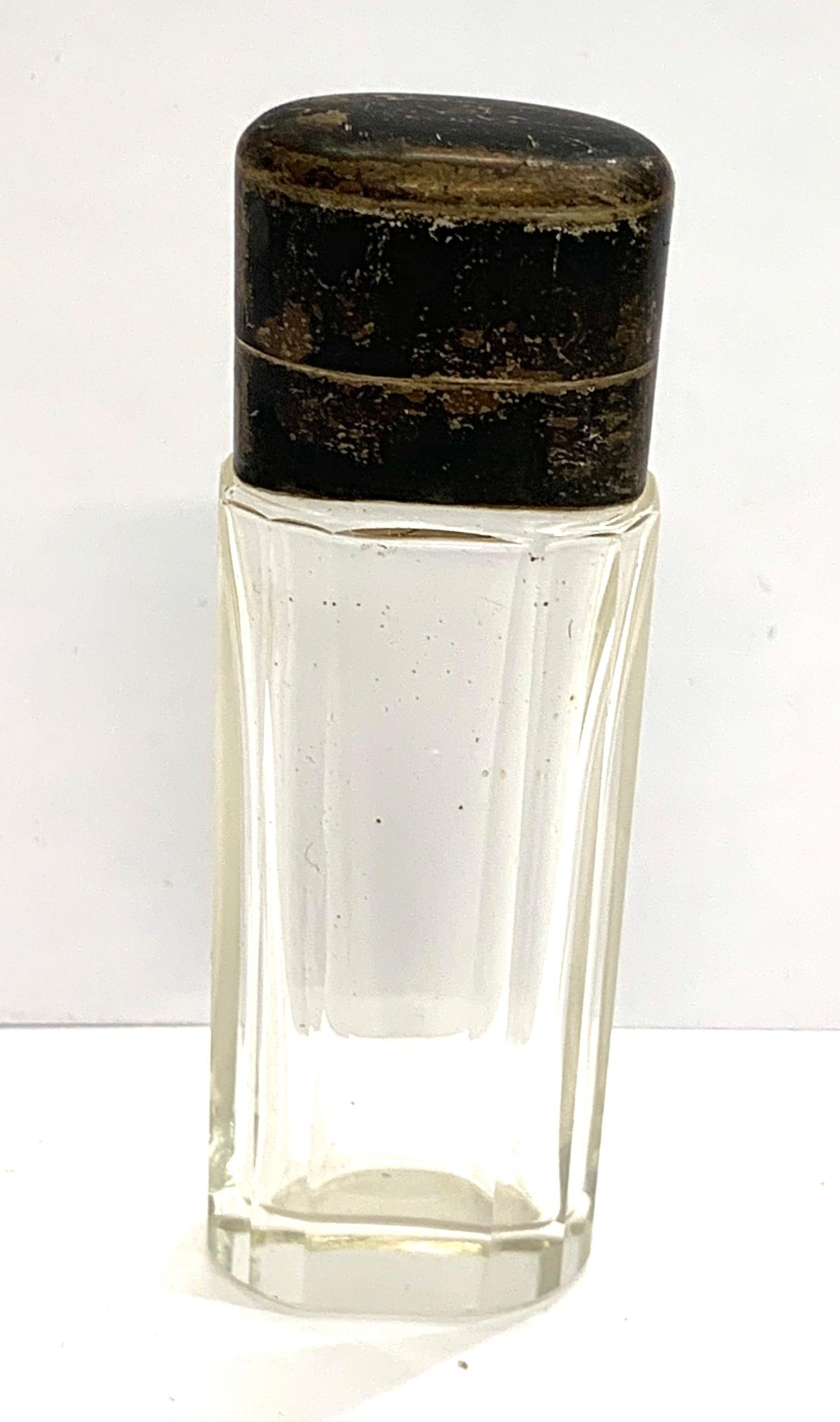 Antique silver top scent perfume bottle in good original condition small sword silver hallmark to