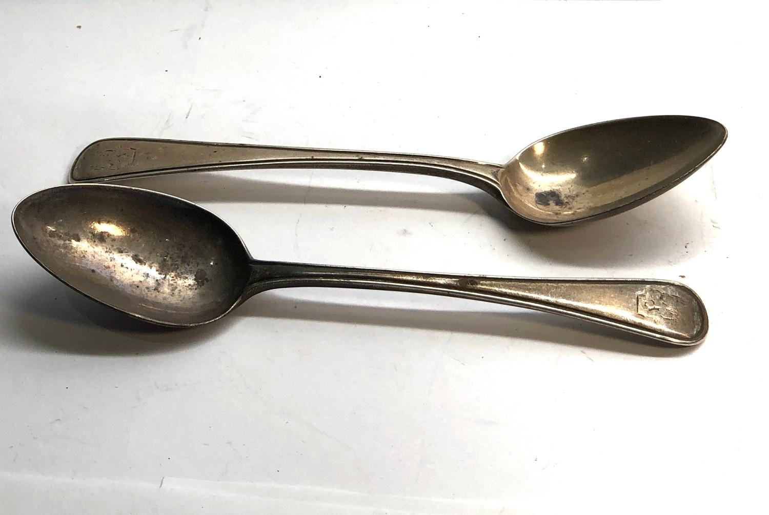 Pair of antique Georgian silver spoons each measures approx 17.5cm London silver hallmarks weight