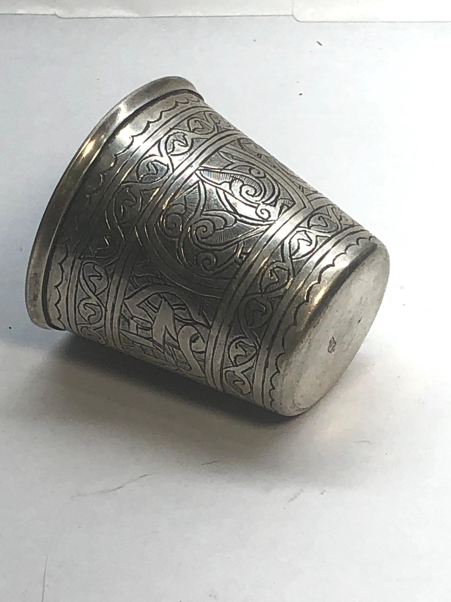 Small islamic silver beaker measures approx 45mm tall diameter 46mm hallmarks to base please see ima - Image 2 of 4