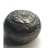 Asian silver lidded bowl floral embossed design measures approx 9.2cm dia not hallmarked but has