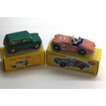 2 Dinky Car Reissues 197 Morris mini traveller and 111 triumph tr2 sports please see images for