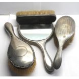 Antique silver backed mirror and brushes