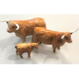 Beswick Highland bull, cow and a calf, overall good condition