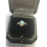 Opal and diamond ring